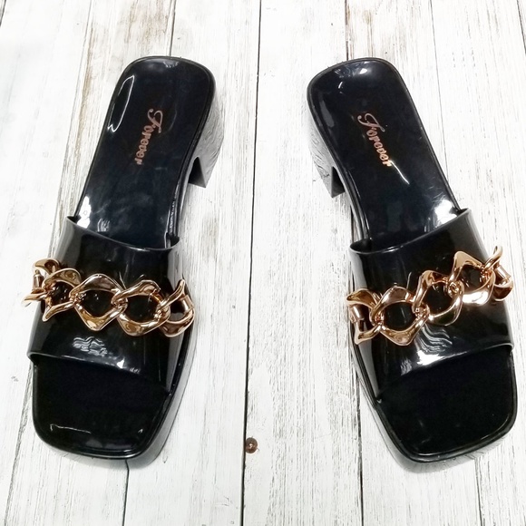 Elegant Black Sandals with Gold Accents - Picture 5 of 5